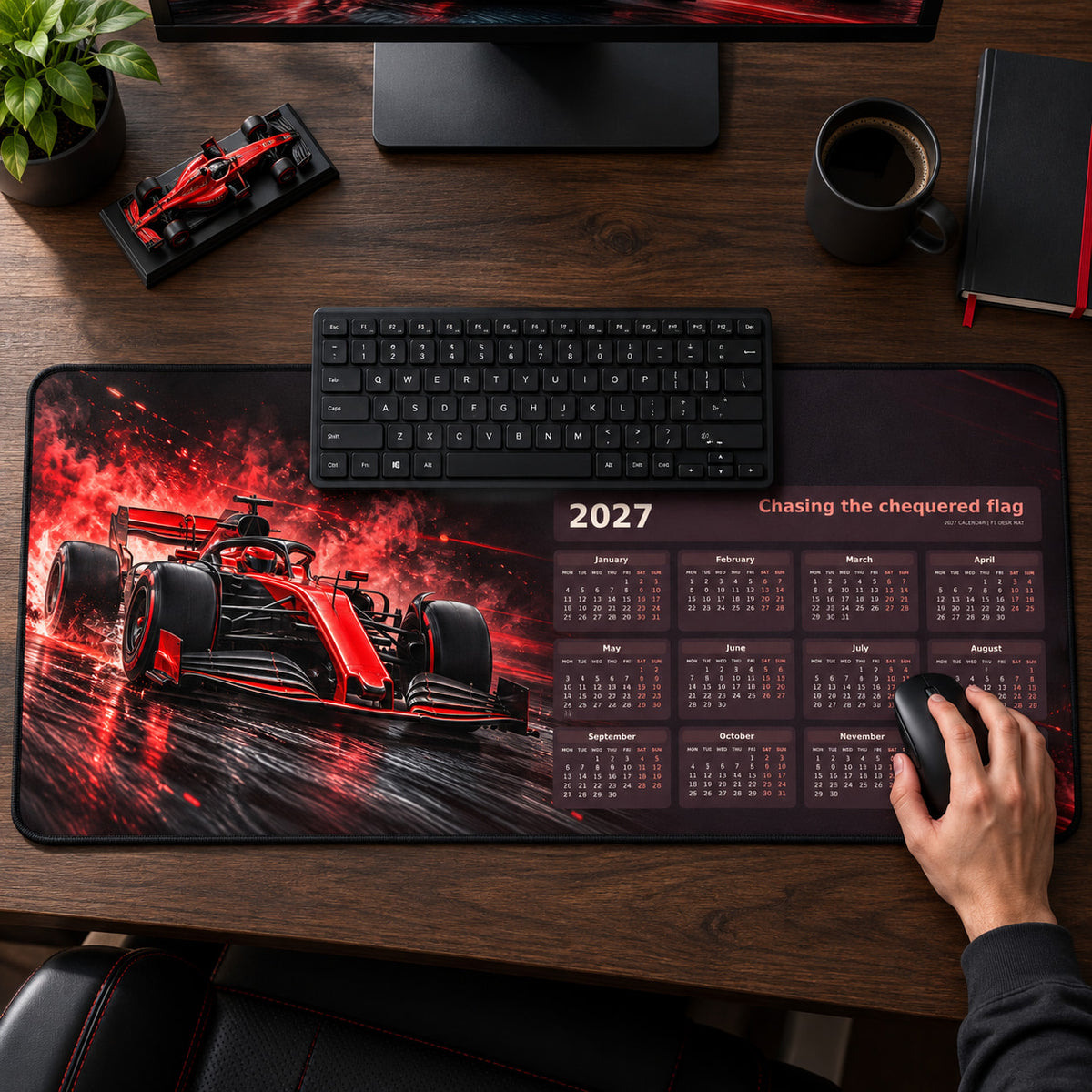 Scarlet Speed 2027 calendar desk pad in use with a computer mouse on a styled desk.