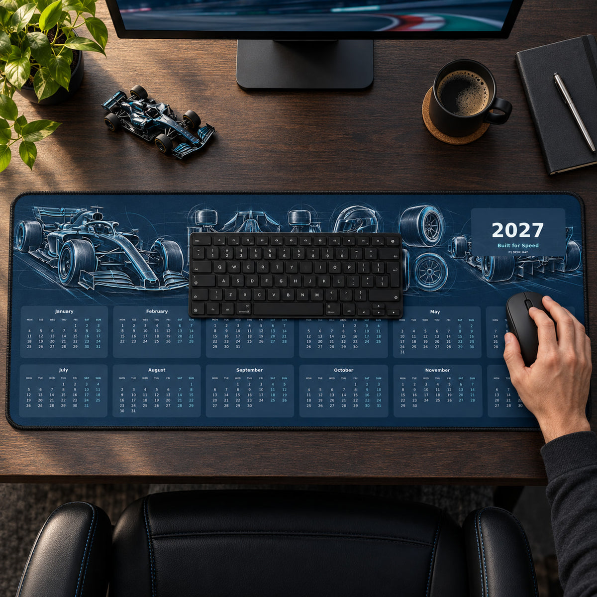 Technical Racer 2027 calendar desk pad in use with a computer mouse on a styled desk.