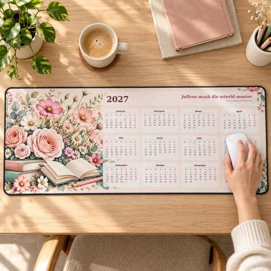Juffrou Flower Garden 2027 calendar desk pad in use with a computer mouse on a styled desk.