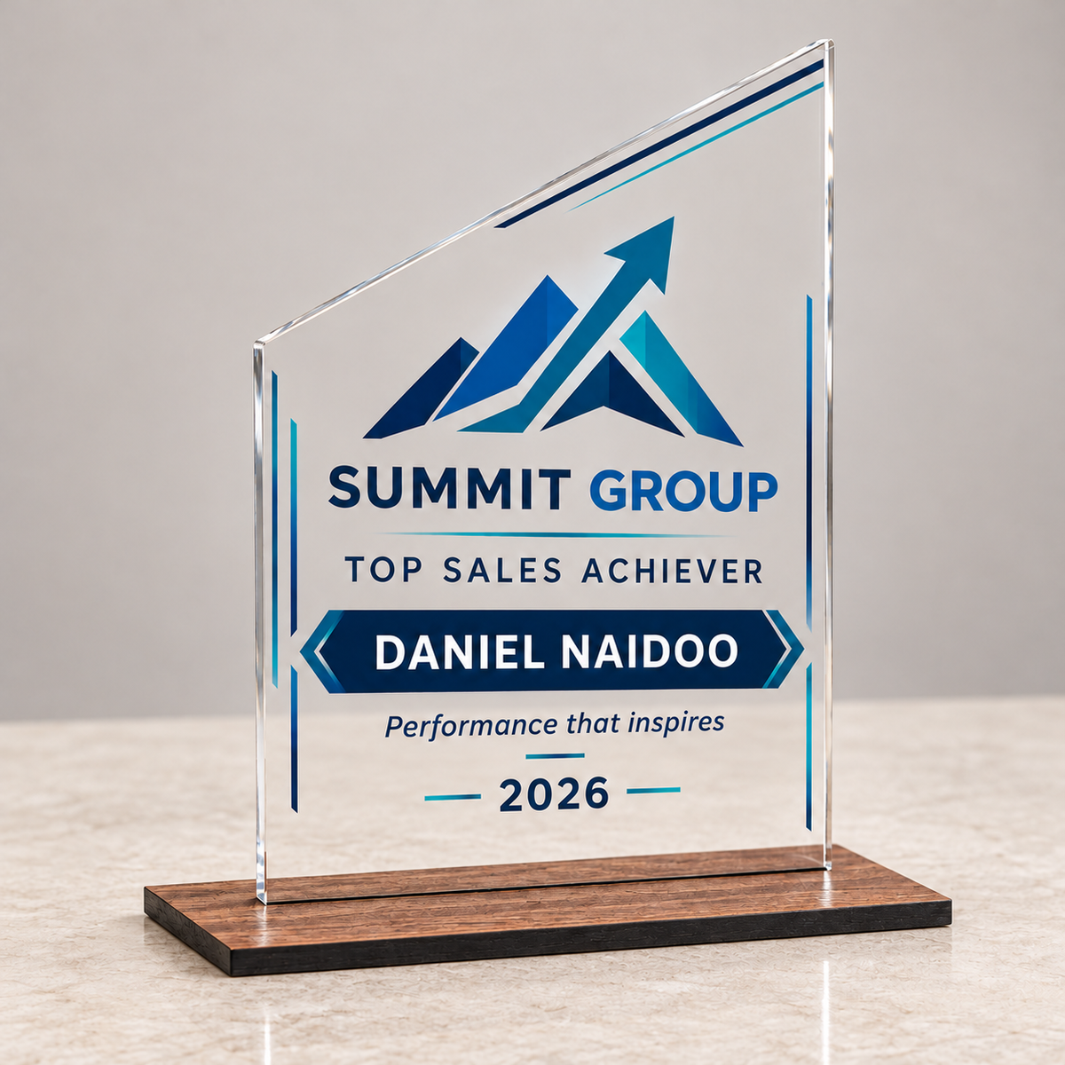 Angled acrylic corporate sales achievement award with DTF sticker and slim wood base