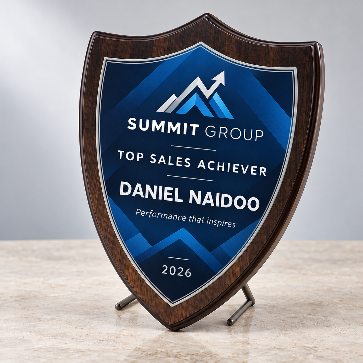 Shield wood and glass trophy with a personalised corporate sales achievement design
